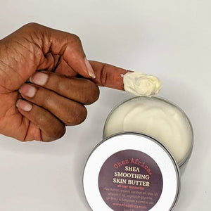 Chez Africa | shea smoothing skin butter on fingertip
